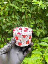 Load image into Gallery viewer, Glass strawberry glow in the dark pipe + strawberry 2.5 inch aluminum grinder